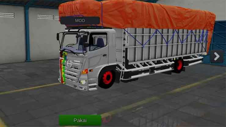 Truk Hino Oleng Terpal Oren Full Muatan